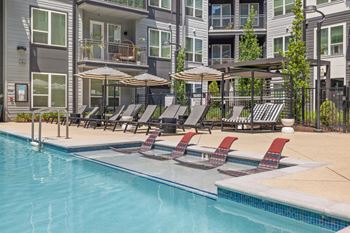 Resort-style saltwater pool with tanning ledge